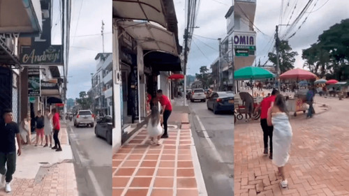 Escándalo en Colombia por mujer sorprendida con su amante en hotel y suplicando perdón envuelta en una sábana